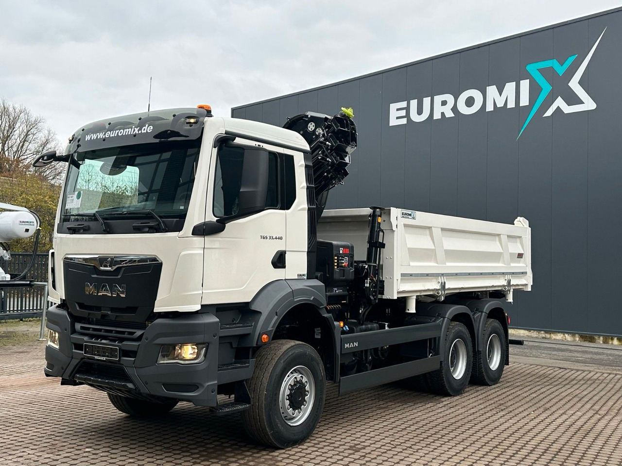 MAN TGS 33.440 6x6 /3-Seiten- Kipper / Kran HIAB 302 - Самосвал, Автоманипулятор: фото 1 MAN TGS 33.440 6x6 /3-Seiten- Kipper / Kran HIAB 302 - Самосвал, Автоманипулятор: фото 1