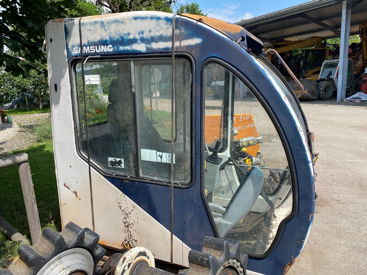 Samsung SE 210 - Кабина для Строительной техники: фото 5 Samsung SE 210 - Кабина для Строительной техники: фото 5