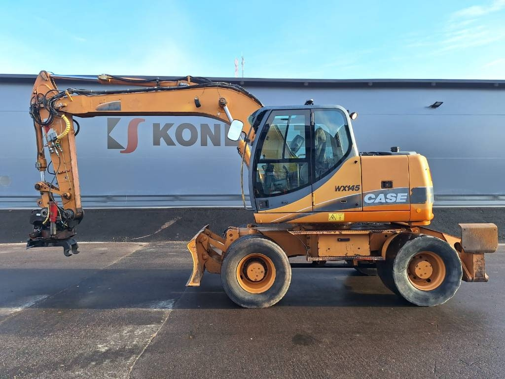 Case WX145 PYÖRITTÄJÄLLÄ  - Колёсный экскаватор: фото 1 Case WX145 PYÖRITTÄJÄLLÄ  - Колёсный экскаватор: фото 1