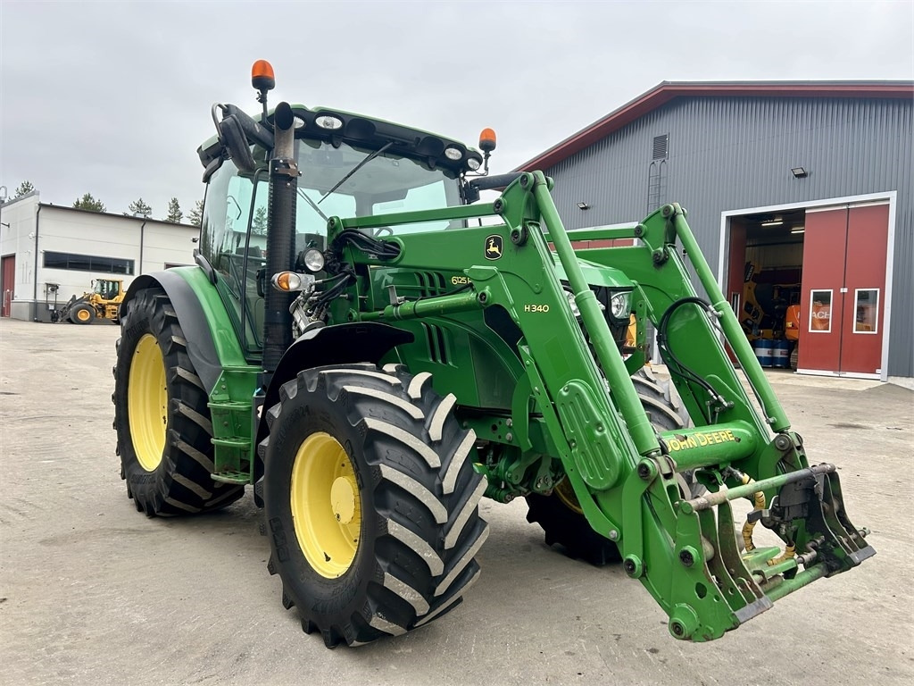 John Deere 6125 R AUTOPOWER ETUKUORMAAJALLA - Трактор: фото 4 John Deere 6125 R AUTOPOWER ETUKUORMAAJALLA - Трактор: фото 4