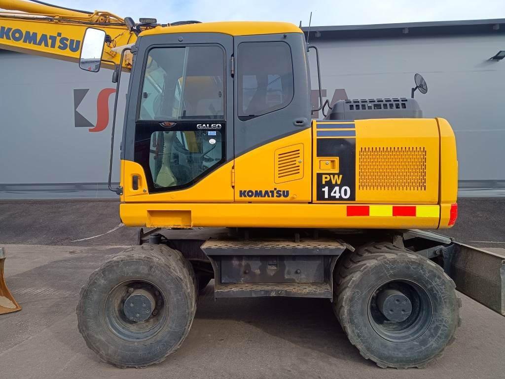 Komatsu PW140-7 PYÖRITTÄJÄLLÄ - Колёсный экскаватор: фото 2 Komatsu PW140-7 PYÖRITTÄJÄLLÄ - Колёсный экскаватор: фото 2