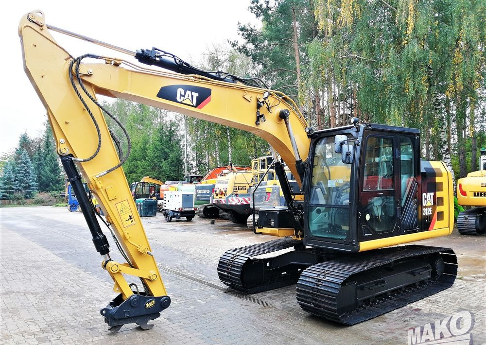 Caterpillar 312E - Гусеничный экскаватор: фото 1 Caterpillar 312E - Гусеничный экскаватор: фото 1