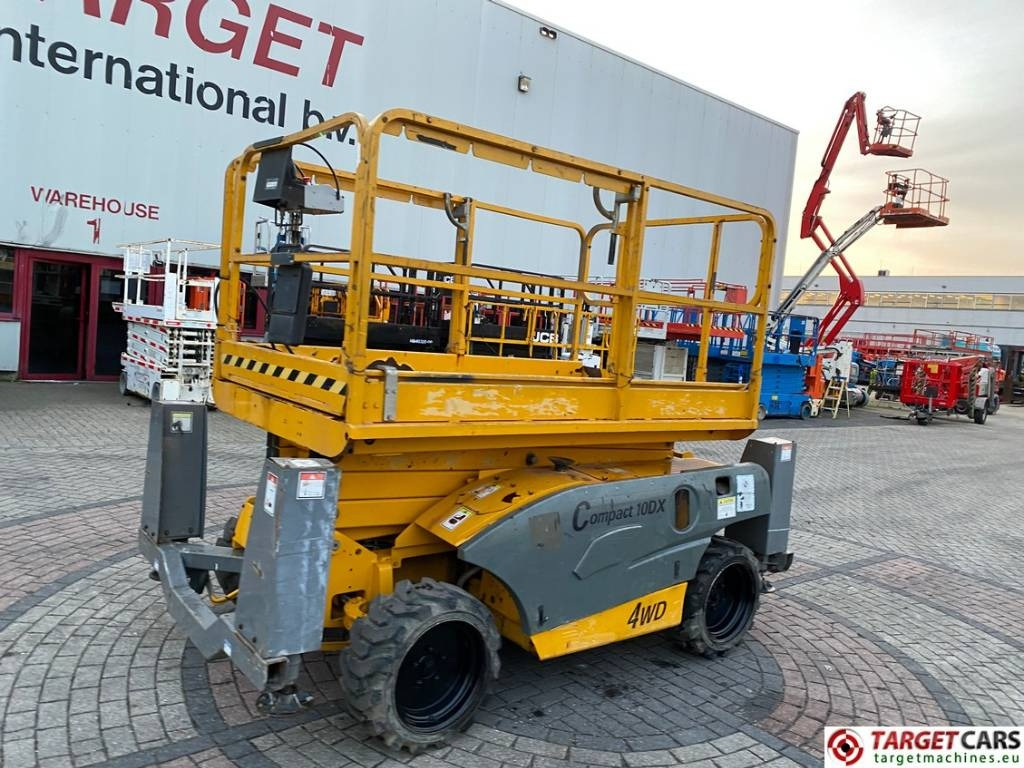 Haulotte Compact 10DX Diesel 4x4 Scissor Work Lift 1015cm - Ножничный подъемник: фото 1 Haulotte Compact 10DX Diesel 4x4 Scissor Work Lift 1015cm - Ножничный подъемник: фото 1
