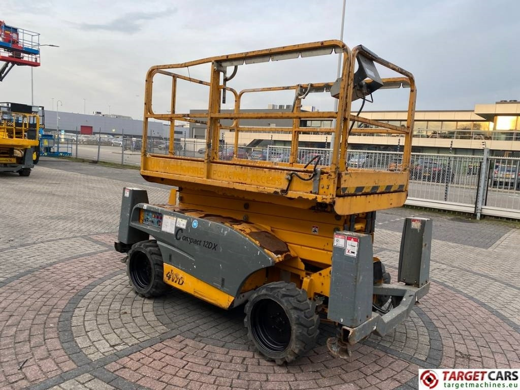 Haulotte Compact 12DX Diesel 4x4 Scissor Work Lift 1206cm - Ножничный подъемник: фото 2 Haulotte Compact 12DX Diesel 4x4 Scissor Work Lift 1206cm - Ножничный подъемник: фото 2