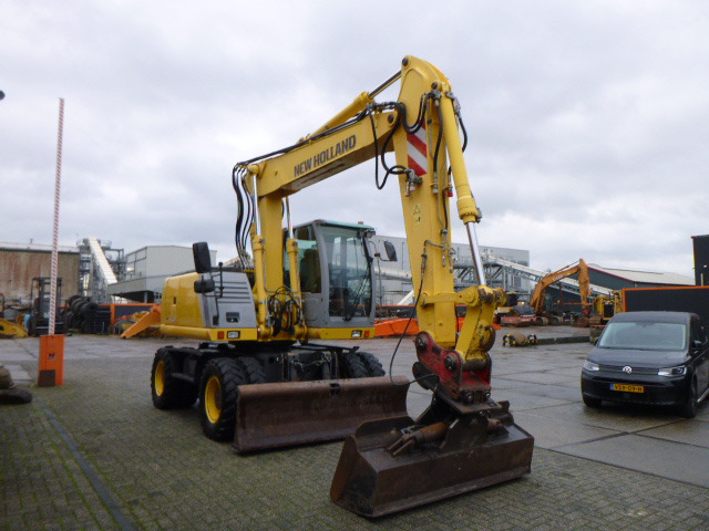 Колёсный экскаватор NEW HOLLAND MH PLUS: фото 6