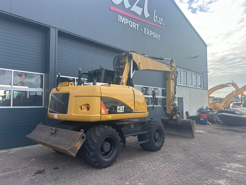 Caterpillar M313D - Колёсный экскаватор: фото 4 Caterpillar M313D - Колёсный экскаватор: фото 4