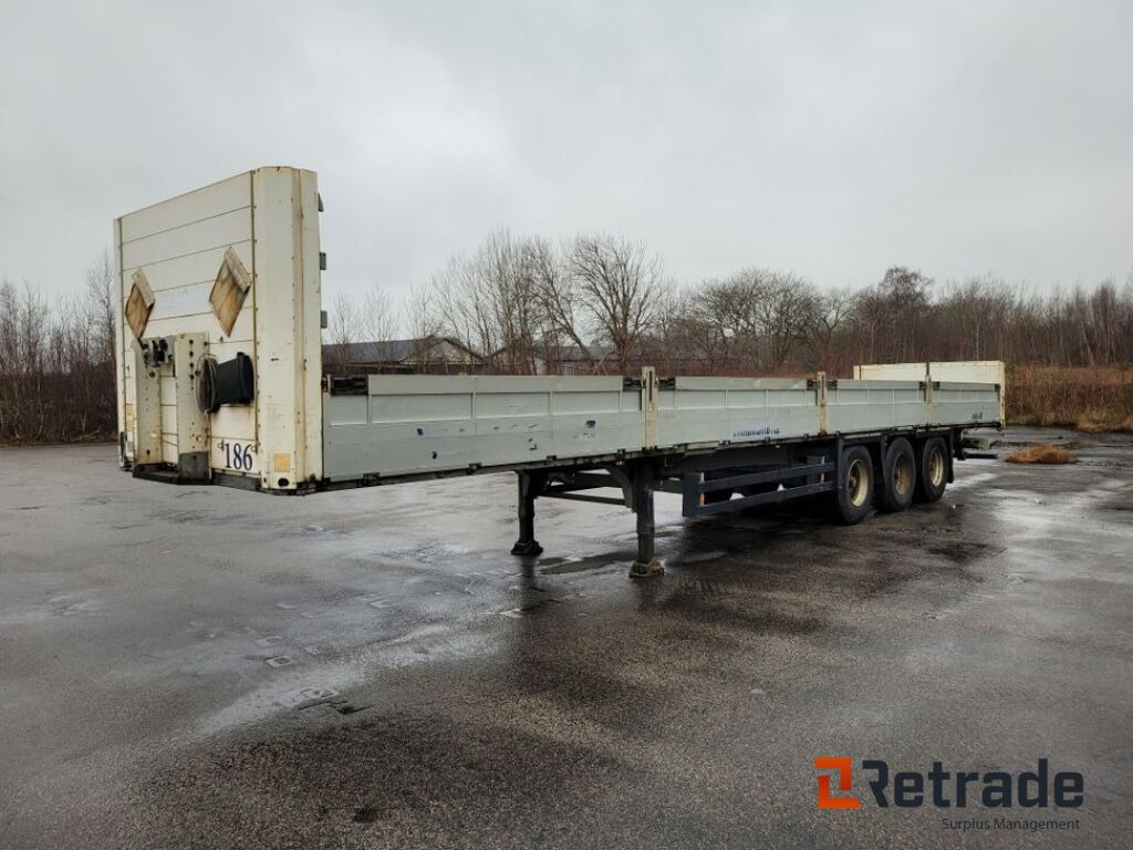 3-axlig trailer med lämmar SCHMITS, S01 Flaktrailer - Полуприцеп бортовой/ Платформа: фото 1 3-axlig trailer med lämmar SCHMITS, S01 Flaktrailer - Полуприцеп бортовой/ Платформа: фото 1