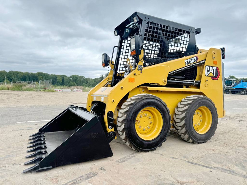 Cat 216B3 - New / Unused / Extra Hydraulic - Мини-погрузчик с бортовым поворотом: фото 1 Cat 216B3 - New / Unused / Extra Hydraulic - Мини-погрузчик с бортовым поворотом: фото 1