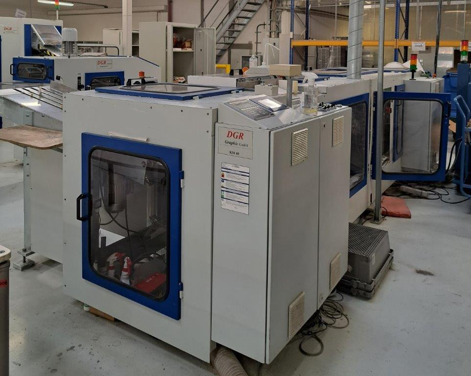 Book on Demand Perfect Binder - spine gluing station DGR Graphic KM 40 - Переплетная машина: фото 1 Book on Demand Perfect Binder - spine gluing station DGR Graphic KM 40 - Переплетная машина: фото 1