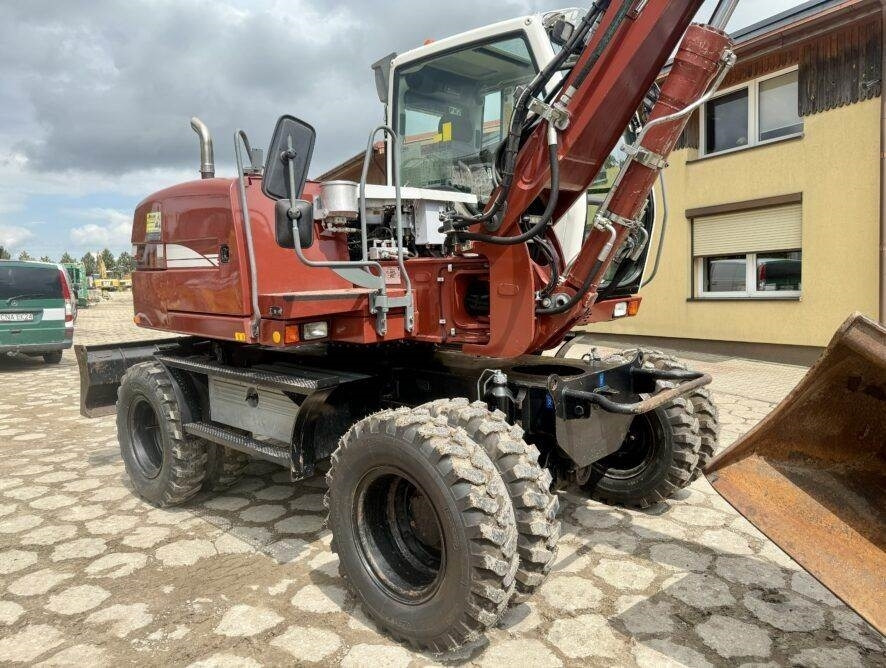 Liebherr A311 Litronic - Колёсный экскаватор: фото 2 Liebherr A311 Litronic - Колёсный экскаватор: фото 2