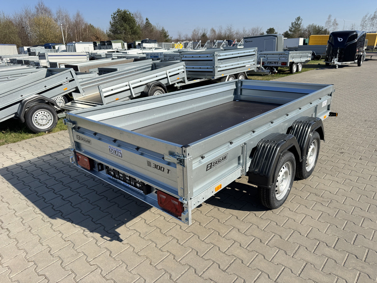 ZASŁAW 300T - przyczepa skrzyniowa 2 osie / 750kg - Прицеп для легкового автомобиля: фото 4 ZASŁAW 300T - przyczepa skrzyniowa 2 osie / 750kg - Прицеп для легкового автомобиля: фото 4