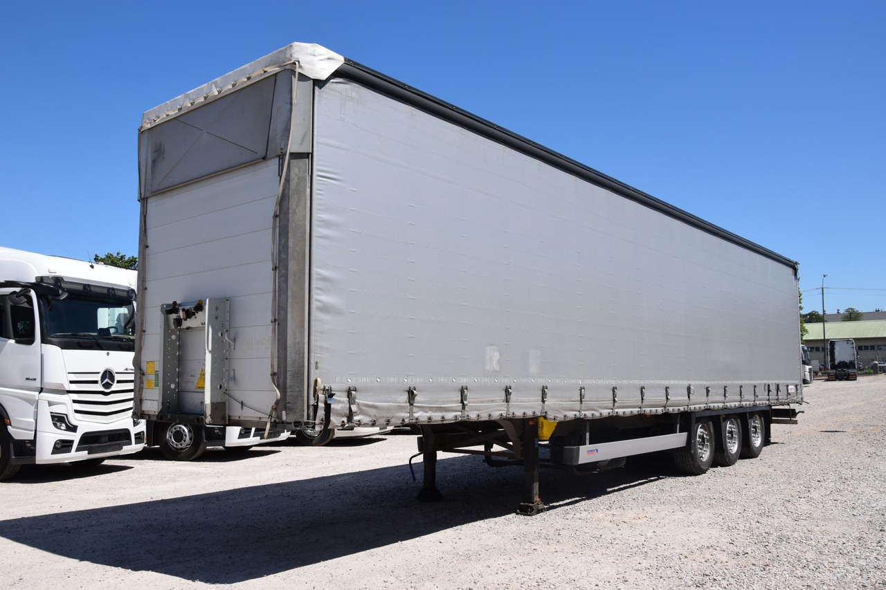 Schmitz Cargobull SCS24/L Varios - Тентованный полуприцеп: фото 1 Schmitz Cargobull SCS24/L Varios - Тентованный полуприцеп: фото 1