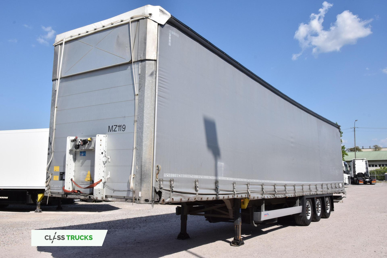 Schmitz Cargobull SCS24/L Varios - Тентованный полуприцеп: фото 1 Schmitz Cargobull SCS24/L Varios - Тентованный полуприцеп: фото 1
