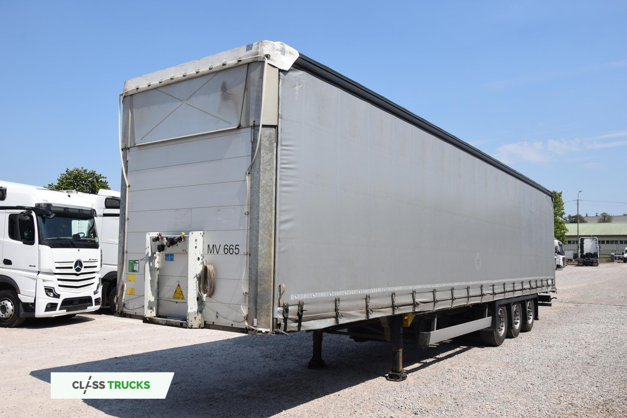 Schmitz Cargobull SCS24/L Varios - Тентованный полуприцеп: фото 1 Schmitz Cargobull SCS24/L Varios - Тентованный полуприцеп: фото 1