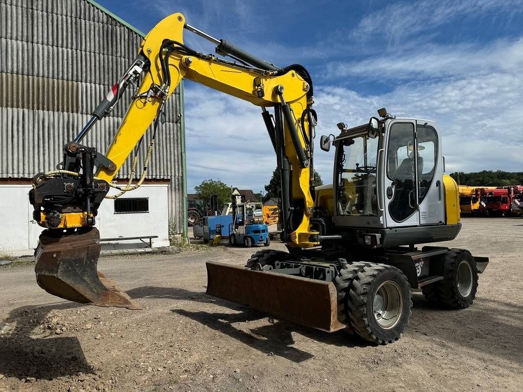 Wacker Neuson EW 100 - Колёсный экскаватор: фото 1 Wacker Neuson EW 100 - Колёсный экскаватор: фото 1