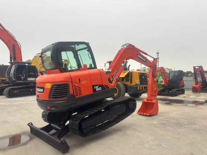 Doosan DX60 DX60-9c DH60-7 DX60W DX80 DX75 DX55 DH35 DH55 Used Mini Excavator Mas Maquinaria Municipal Y Ambiental - Экскаватор: фото 2 Doosan DX60 DX60-9c DH60-7 DX60W DX80 DX75 DX55 DH35 DH55 Used Mini Excavator Mas Maquinaria Municipal Y Ambiental - Экскаватор: фото 2