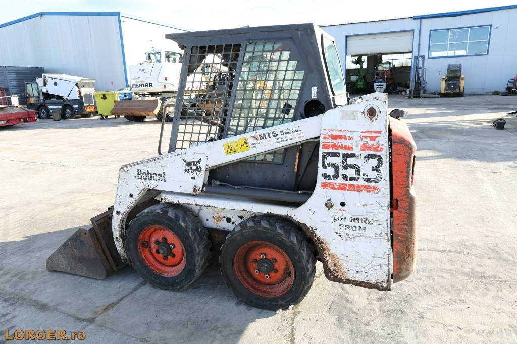 Bobcat 553 - Мини-погрузчик с бортовым поворотом: фото 2 Bobcat 553 - Мини-погрузчик с бортовым поворотом: фото 2