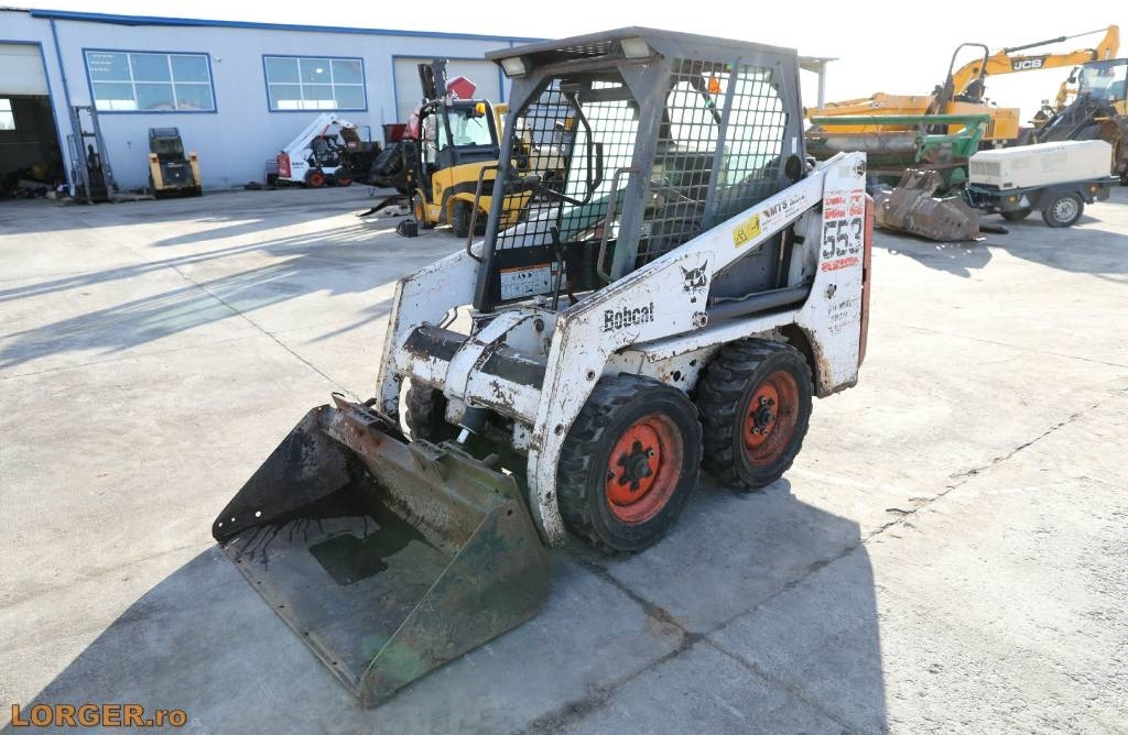 Bobcat 553 - Мини-погрузчик с бортовым поворотом: фото 1 Bobcat 553 - Мини-погрузчик с бортовым поворотом: фото 1