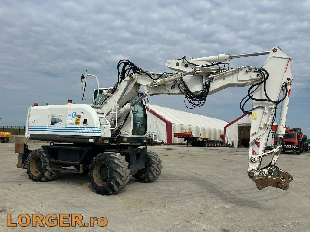 Hitachi ZX 140 W-3 - Колёсный экскаватор: фото 1 Hitachi ZX 140 W-3 - Колёсный экскаватор: фото 1