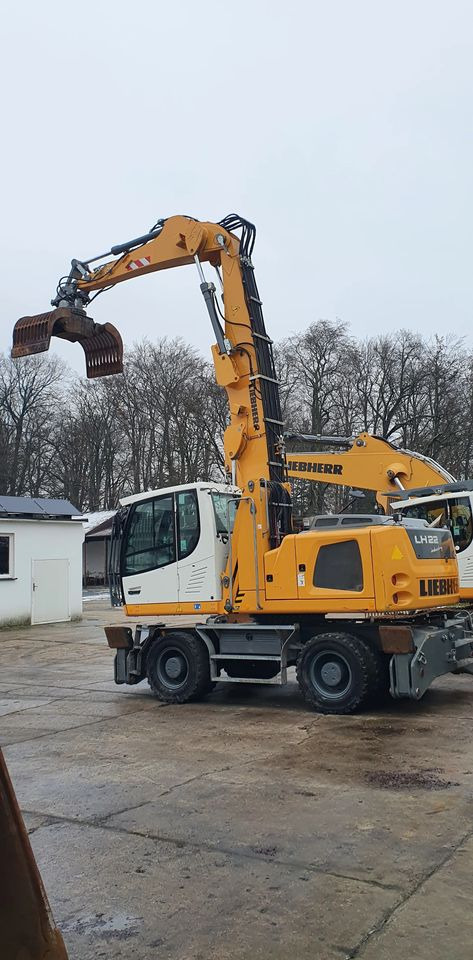 Liebherr LH22 M - Колёсный экскаватор: фото 2 Liebherr LH22 M - Колёсный экскаватор: фото 2