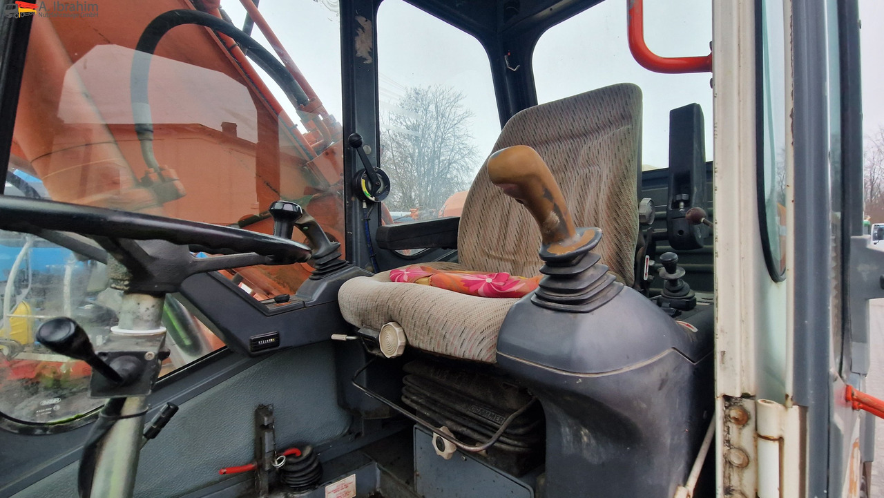 Atlas 1604K Verstellausleger - Колёсный экскаватор: фото 5 Atlas 1604K Verstellausleger - Колёсный экскаватор: фото 5