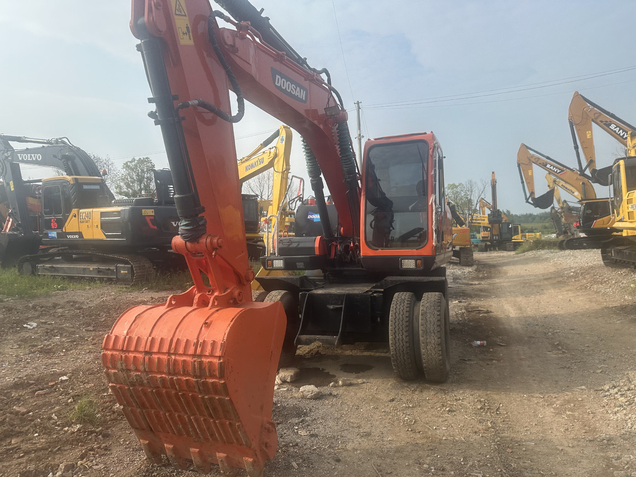 Doosan DX150W-9C - Колёсный экскаватор: фото 5 Doosan DX150W-9C - Колёсный экскаватор: фото 5