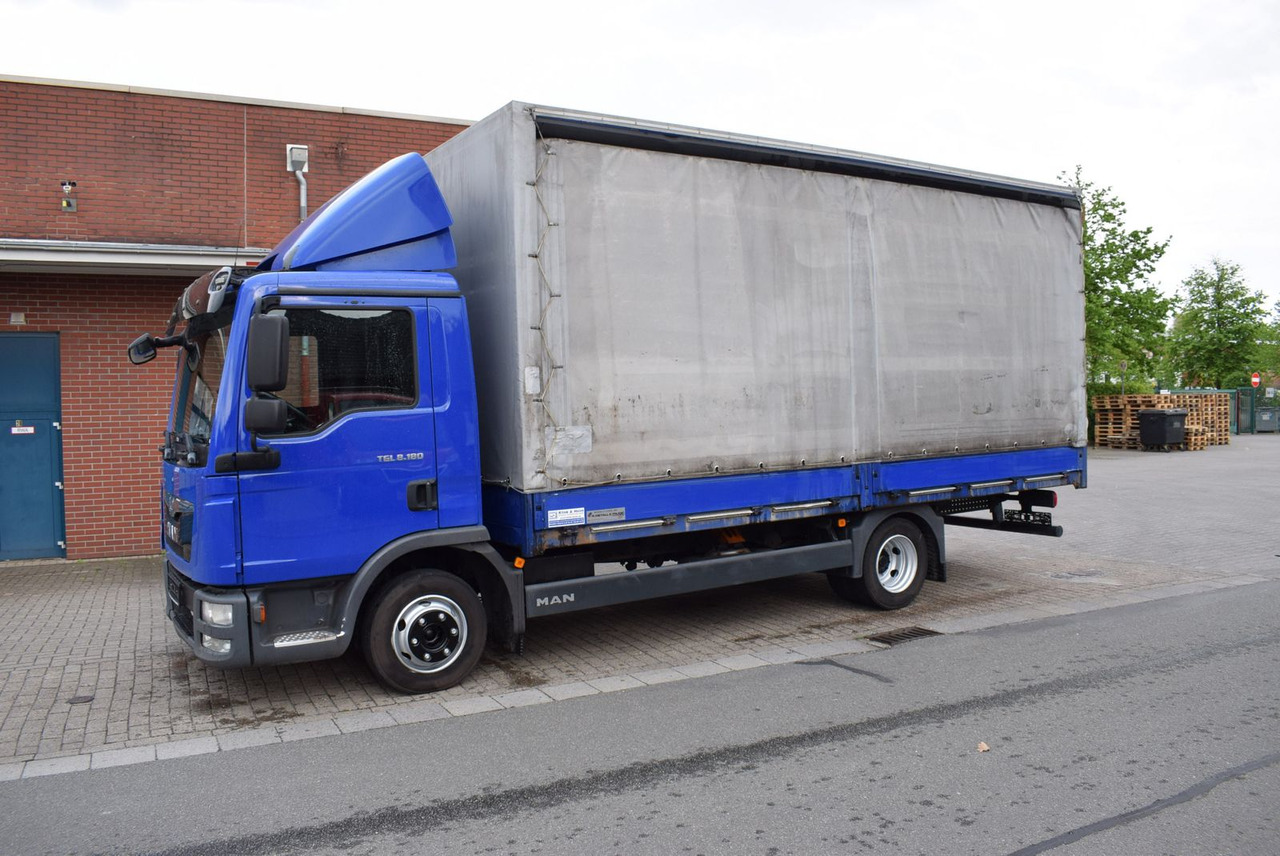 MAN TGL 8.180 Pritsche Schiebeplane Klima 3-Sitzer - Тентованный фургон: фото 2 MAN TGL 8.180 Pritsche Schiebeplane Klima 3-Sitzer - Тентованный фургон: фото 2