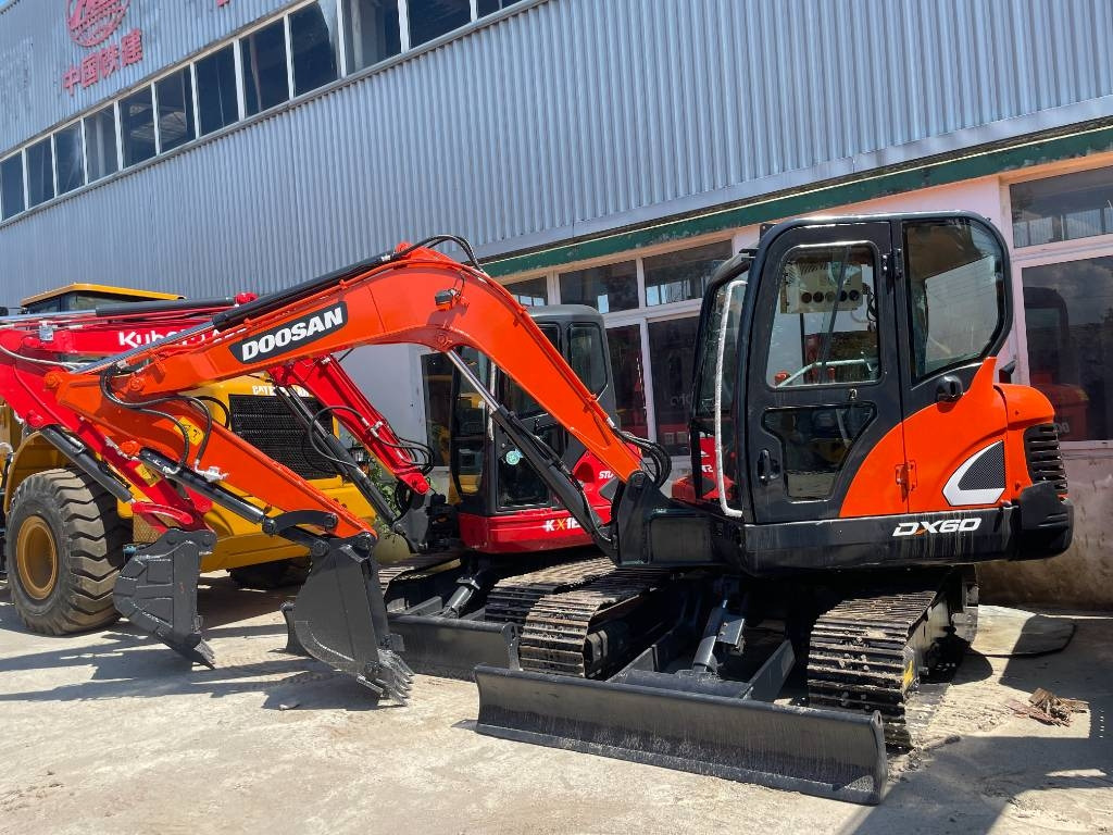 Doosan DX 60 - Мини-экскаватор: фото 1 Doosan DX 60 - Мини-экскаватор: фото 1