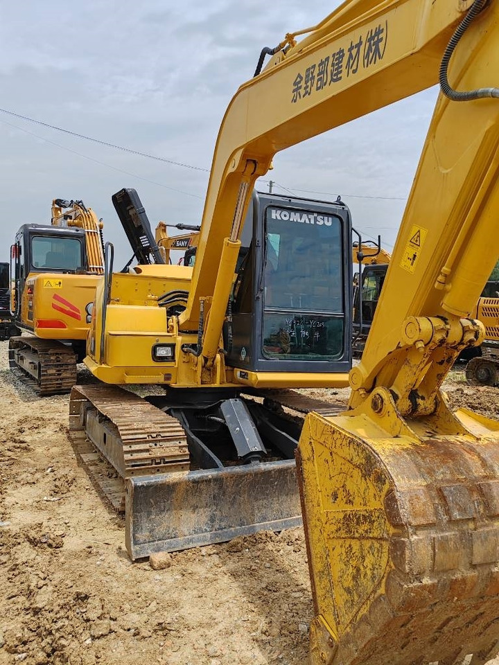 Komatsu PC 100 - Гусеничный экскаватор: фото 5 Komatsu PC 100 - Гусеничный экскаватор: фото 5