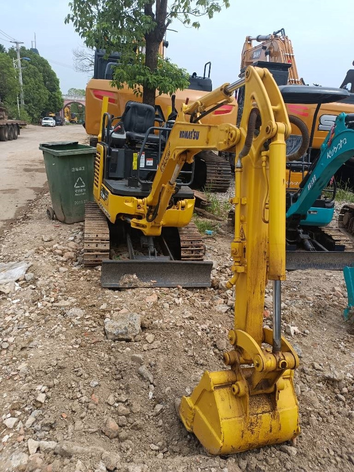 Komatsu PC 18  - Гусеничный экскаватор: фото 2 Komatsu PC 18  - Гусеничный экскаватор: фото 2