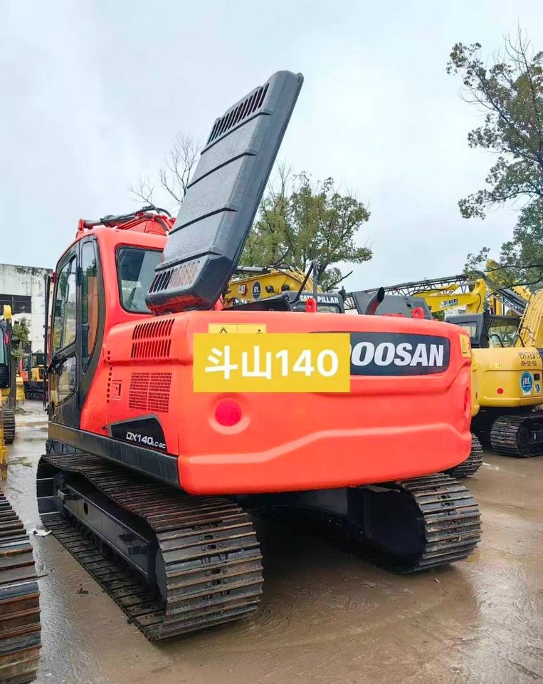 Doosan DX 140 - Гусеничный экскаватор: фото 1 Doosan DX 140 - Гусеничный экскаватор: фото 1