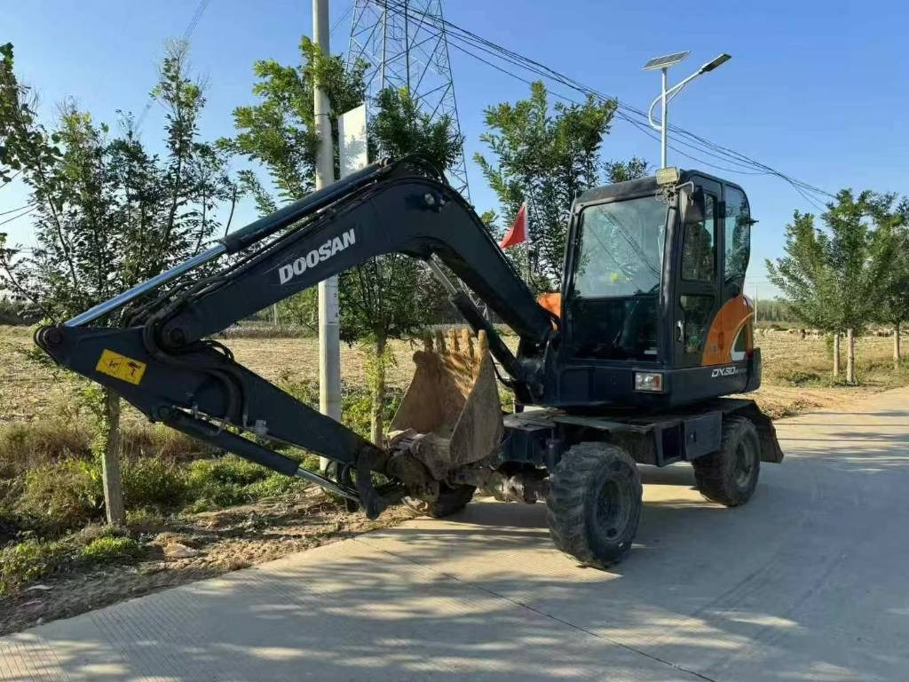 Doosan DX 60 - Мини-экскаватор: фото 1 Doosan DX 60 - Мини-экскаватор: фото 1