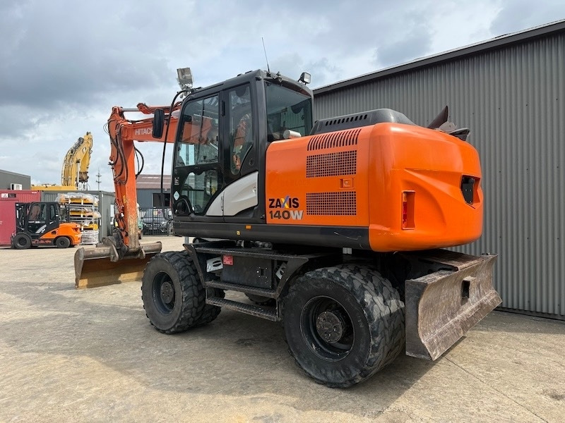 Hitachi ZX 140 W-5 - Колёсный экскаватор: фото 2 Hitachi ZX 140 W-5 - Колёсный экскаватор: фото 2