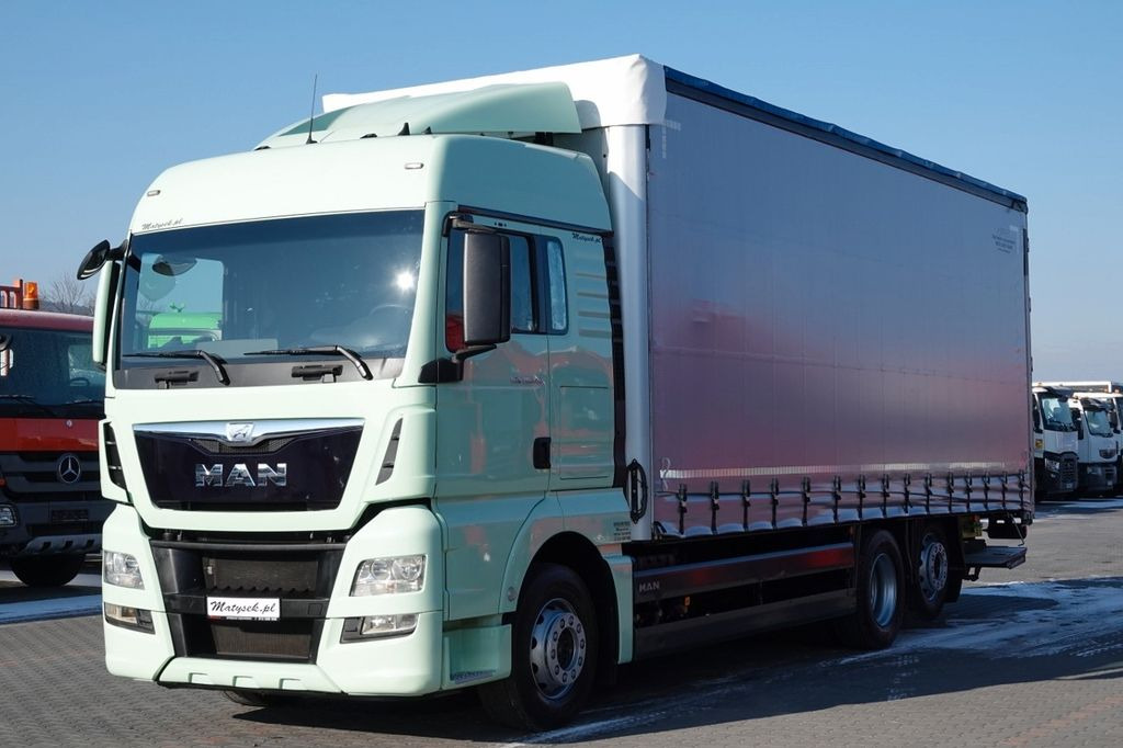 MAN TGX 26.440 / 6x2 / FIRANKA - 8,15 m / SOLÓWKA / - Тентованный грузовик: фото 1 MAN TGX 26.440 / 6x2 / FIRANKA - 8,15 m / SOLÓWKA / - Тентованный грузовик: фото 1