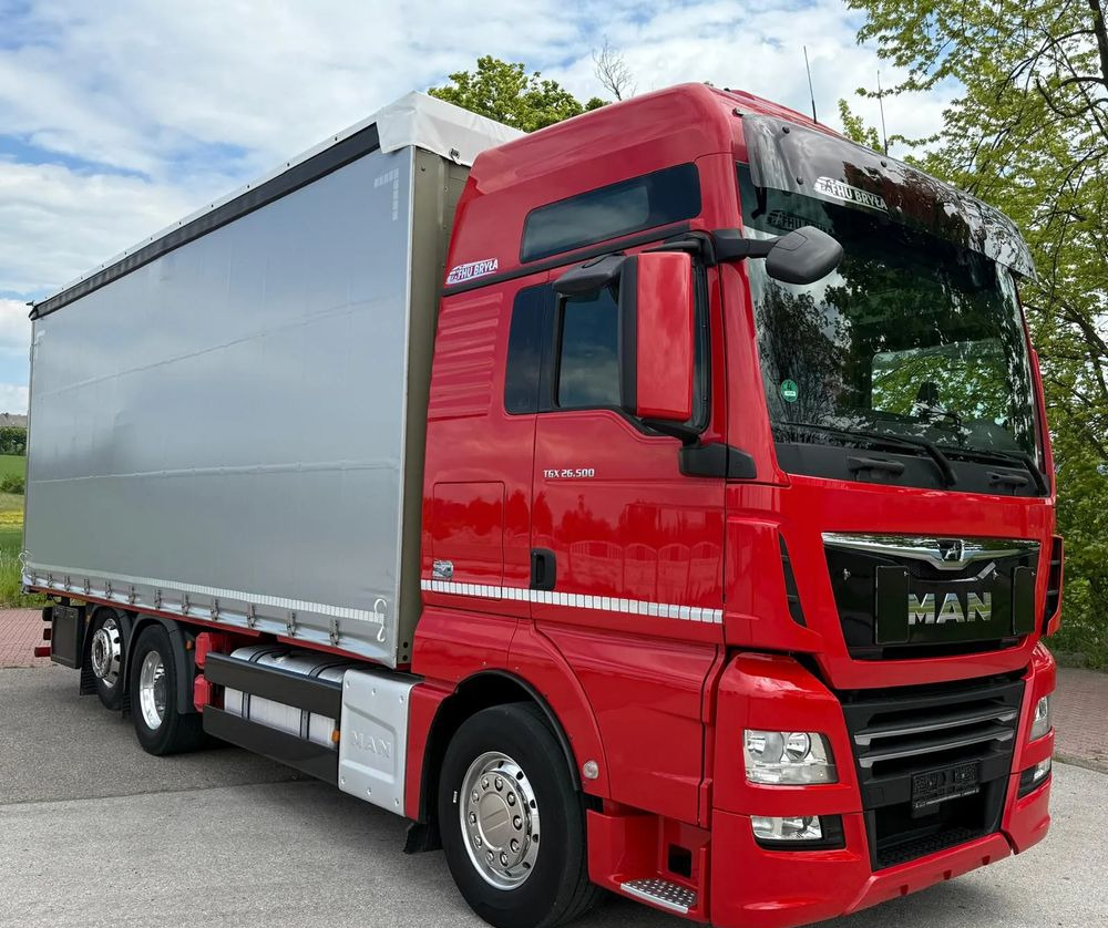 MAN TGX 26.500 / LIFT / 6X2 / KLIMA POSTOJOWA / 18PALET / E6 / FIRANKA / 18 TON ŁADOWNOŚĆ / WINDA / NISKI PRZEBIEG / JEDEN WŁAŚCICIEL / PODWIESZANA OŚ - Тентованный грузовик: фото 2 MAN TGX 26.500 / LIFT / 6X2 / KLIMA POSTOJOWA / 18PALET / E6 / FIRANKA / 18 TON ŁADOWNOŚĆ / WINDA / NISKI PRZEBIEG / JEDEN WŁAŚCICIEL / PODWIESZANA OŚ - Тентованный грузовик: фото 2