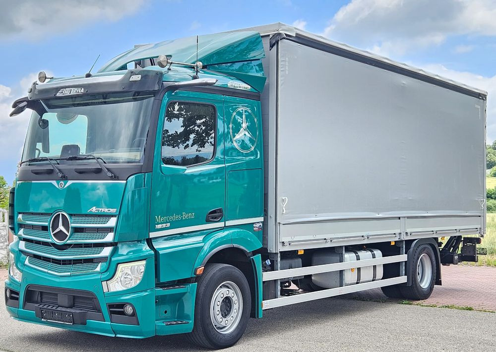 Mercedes-Benz ACTROS 1833 / BURTO-FIRANKA / WINDA / 18 PALET / 8600 ŁADOWNOŚĆ / AUTOMAT / DUŻY SILNIK / 10.2019 ROK / SYPIALKA / LEDY / KAMERY / VIRTUAL COCPIT/ JAK NOWY - Тентованный грузовик: фото 1 Mercedes-Benz ACTROS 1833 / BURTO-FIRANKA / WINDA / 18 PALET / 8600 ŁADOWNOŚĆ / AUTOMAT / DUŻY SILNIK / 10.2019 ROK / SYPIALKA / LEDY / KAMERY / VIRTUAL COCPIT/ JAK NOWY - Тентованный грузовик: фото 1