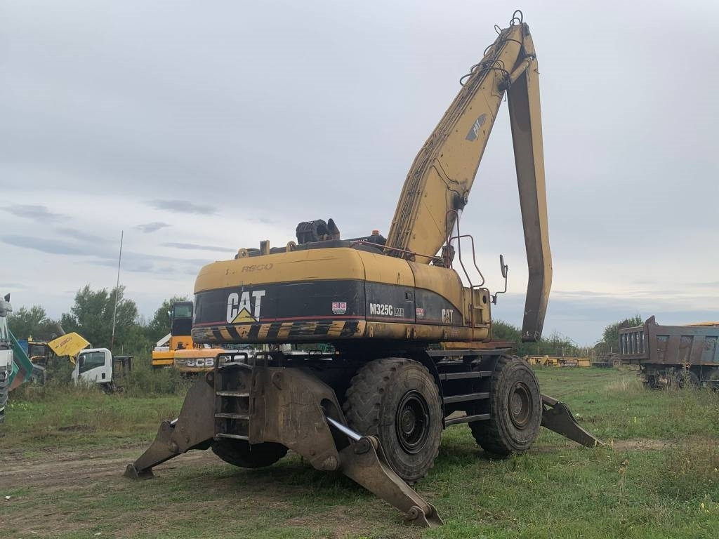 CAT M 325 C L MH - Перегружатель: фото 4 CAT M 325 C L MH - Перегружатель: фото 4