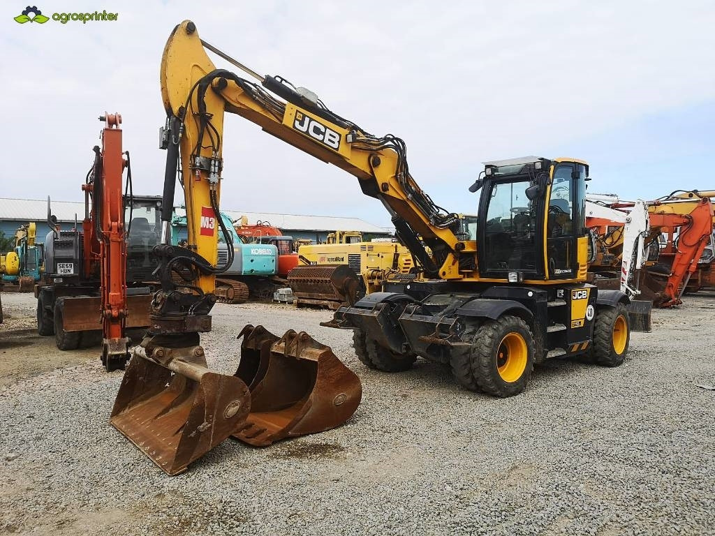 JCB Hydradig 110W - Колёсный экскаватор: фото 1 JCB Hydradig 110W - Колёсный экскаватор: фото 1