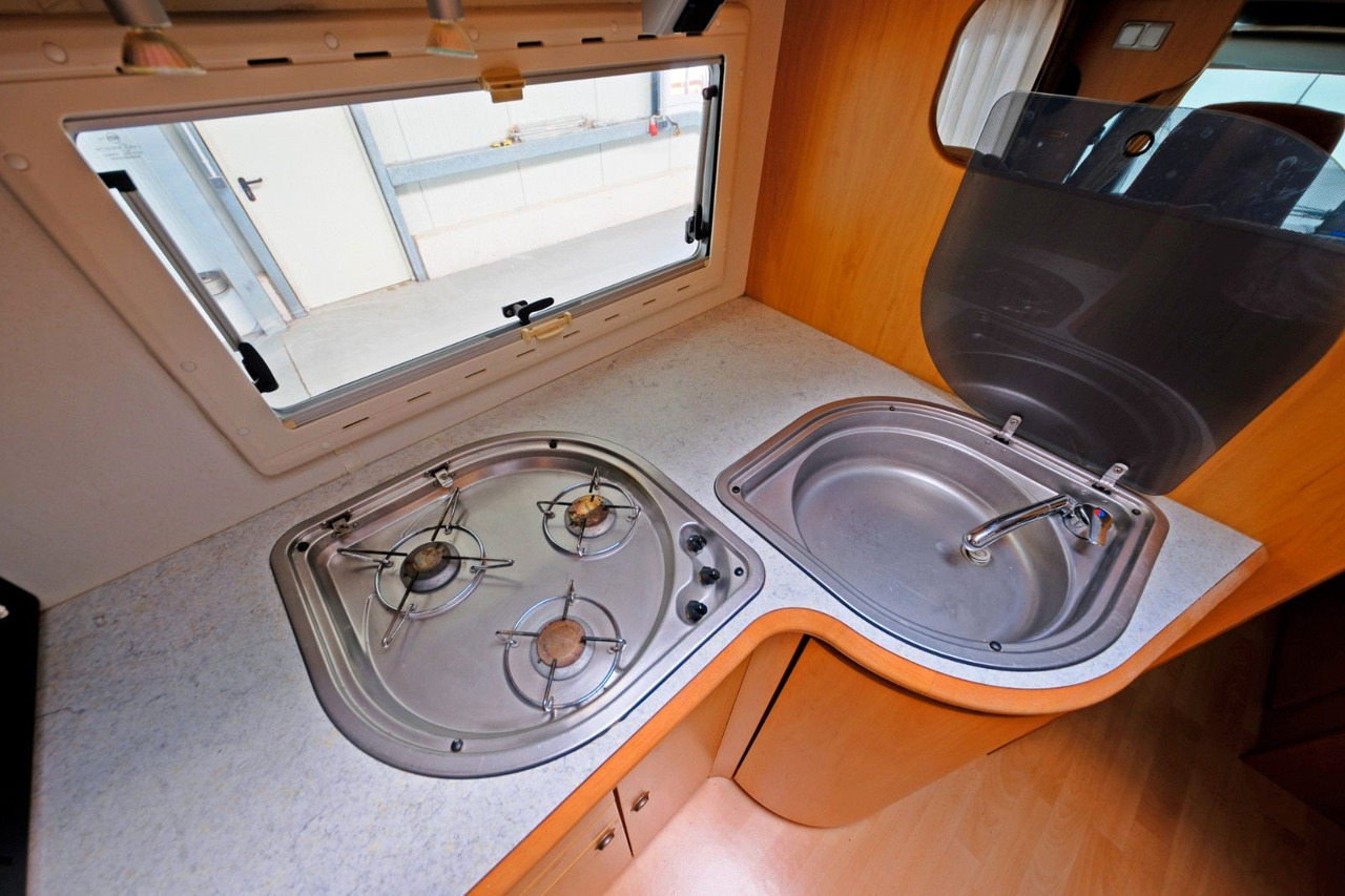 Альковный автодом Cristall A 670 G/Automatik/Festbett/Garage/Solar/Markise: фото 13