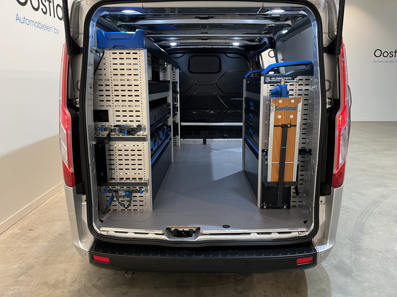 Ford Transit Custom 300 2.0 TDCI L2H1 Trend 130 PK Servicebus / Sortimo Inrichting / Euro 6 / Airco / Cruise Control / Klep / PDC / 3-Zits - Легковой фургон: фото 4 Ford Transit Custom 300 2.0 TDCI L2H1 Trend 130 PK Servicebus / Sortimo Inrichting / Euro 6 / Airco / Cruise Control / Klep / PDC / 3-Zits - Легковой фургон: фото 4