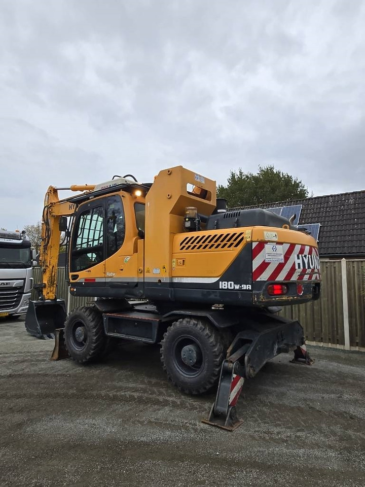 Hyundai R 180W-9A - Колёсный экскаватор: фото 2 Hyundai R 180W-9A - Колёсный экскаватор: фото 2