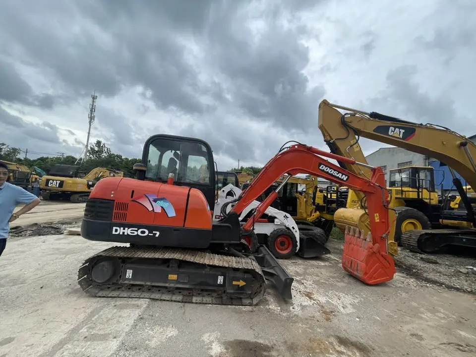 Doosan DH60-7 - Мини-экскаватор: фото 1 Doosan DH60-7 - Мини-экскаватор: фото 1