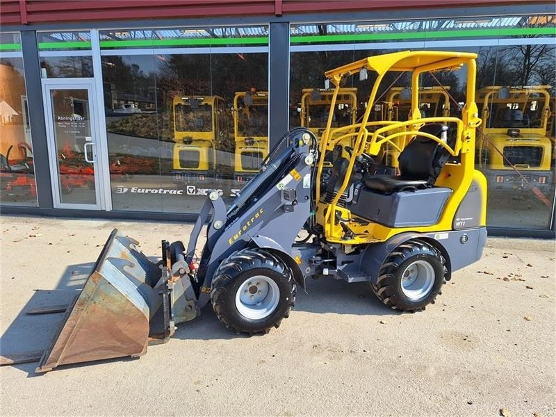 Eurotrac W11 Mellem tårn - Компактный фронтальный погрузчик: фото 1 Eurotrac W11 Mellem tårn - Компактный фронтальный погрузчик: фото 1