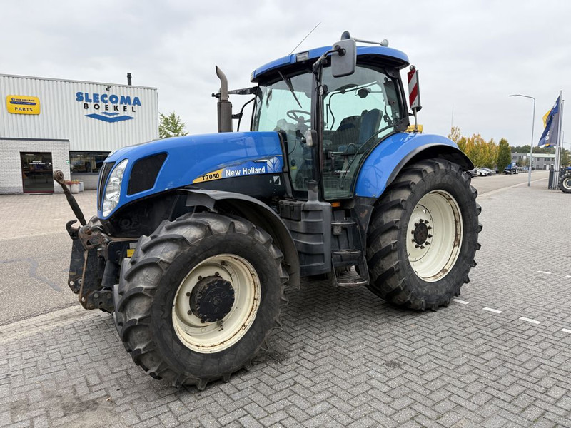 New Holland T7050 Power Command - Трактор: фото 1 New Holland T7050 Power Command - Трактор: фото 1