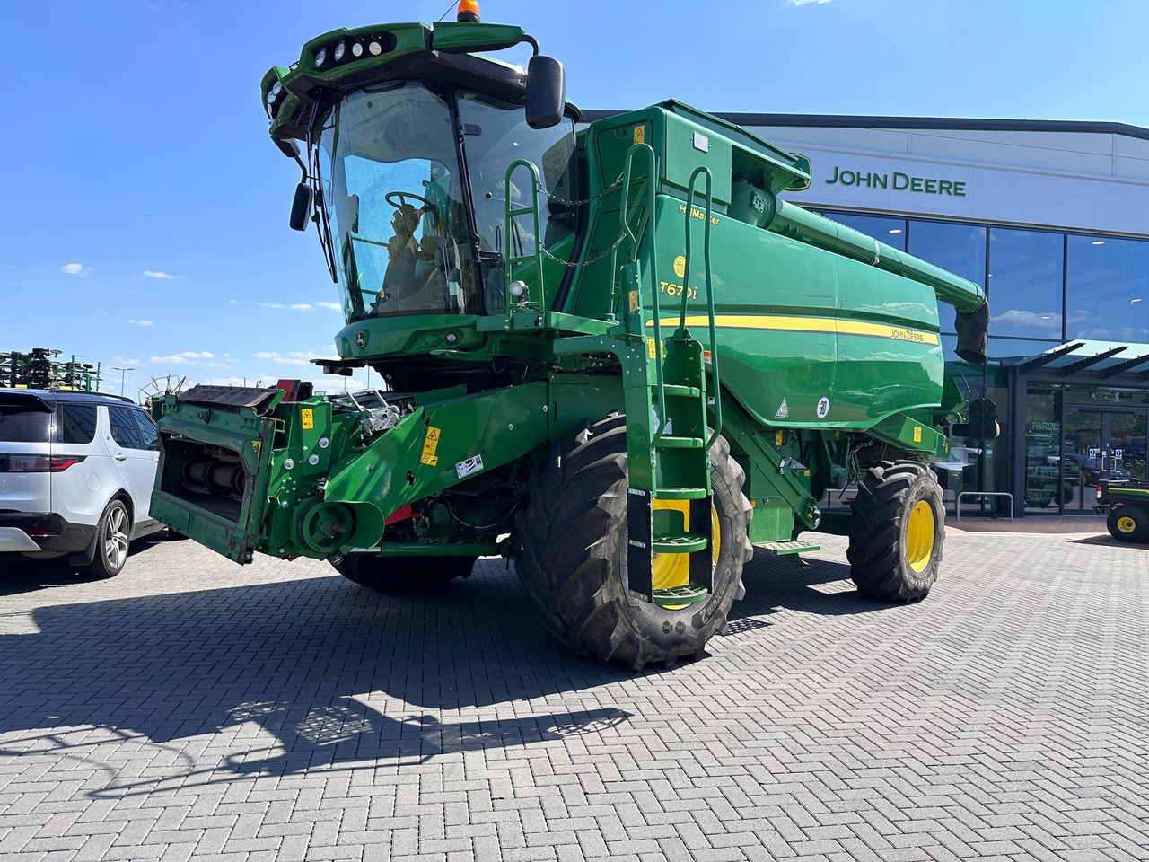 John Deere T670i HM - Зерноуборочный комбайн: фото 1 John Deere T670i HM - Зерноуборочный комбайн: фото 1