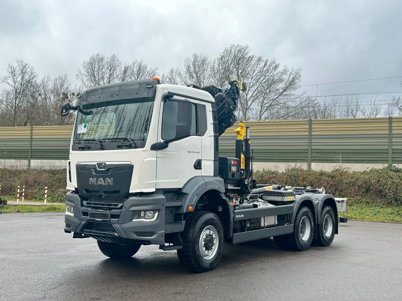 MAN TGS 33.440 6x6 BB Abrollkipper+Kran Hiab 228-6 - Крюковой мультилифт, Автоманипулятор: фото 2 MAN TGS 33.440 6x6 BB Abrollkipper+Kran Hiab 228-6 - Крюковой мультилифт, Автоманипулятор: фото 2