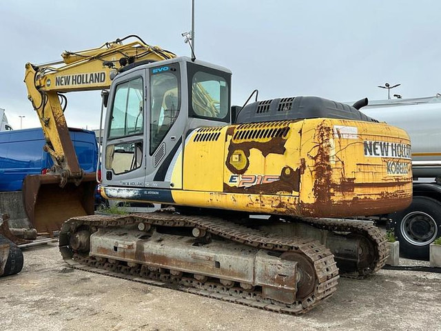 Экскаватор New Holland E215B: фото 16