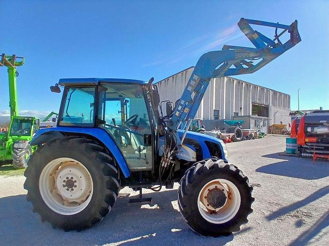 New Holland TL90A - Трактор: фото 1 New Holland TL90A - Трактор: фото 1