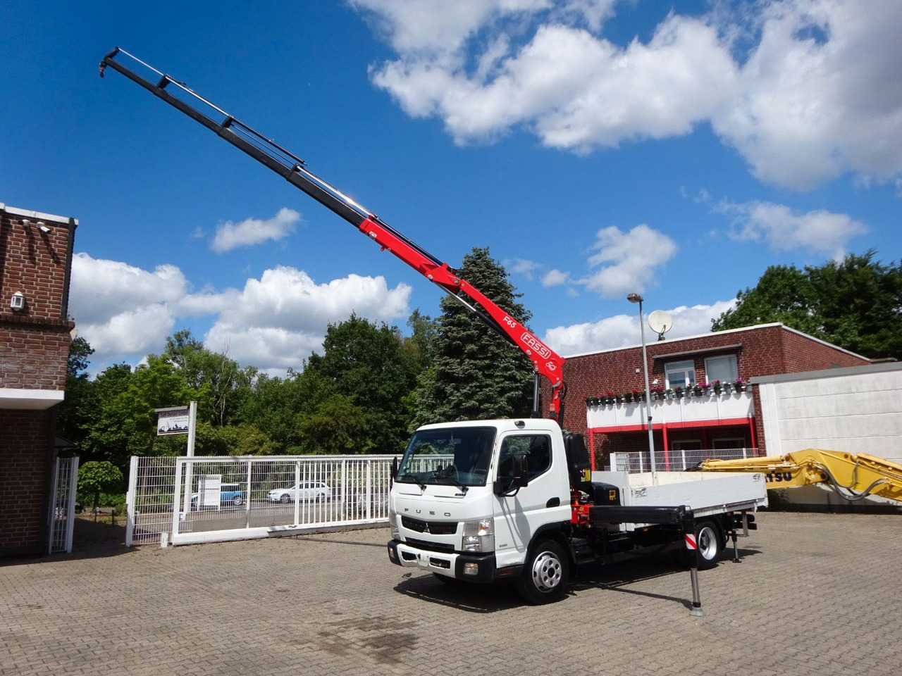 FUSO Canter 7C15 mit FASSI F65A Kran - Автоманипулятор, Грузовик бортовой/ Платформа: фото 1 FUSO Canter 7C15 mit FASSI F65A Kran - Автоманипулятор, Грузовик бортовой/ Платформа: фото 1