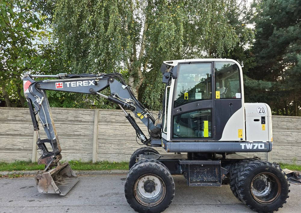 Terex - Колёсный экскаватор: фото 1 Terex - Колёсный экскаватор: фото 1